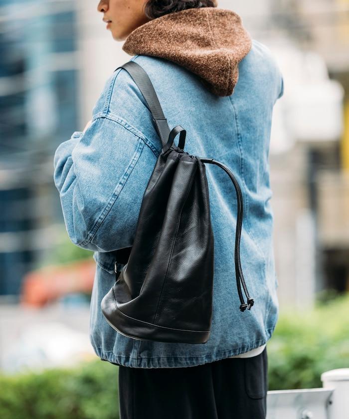 防潑水牛皮束口單肩包