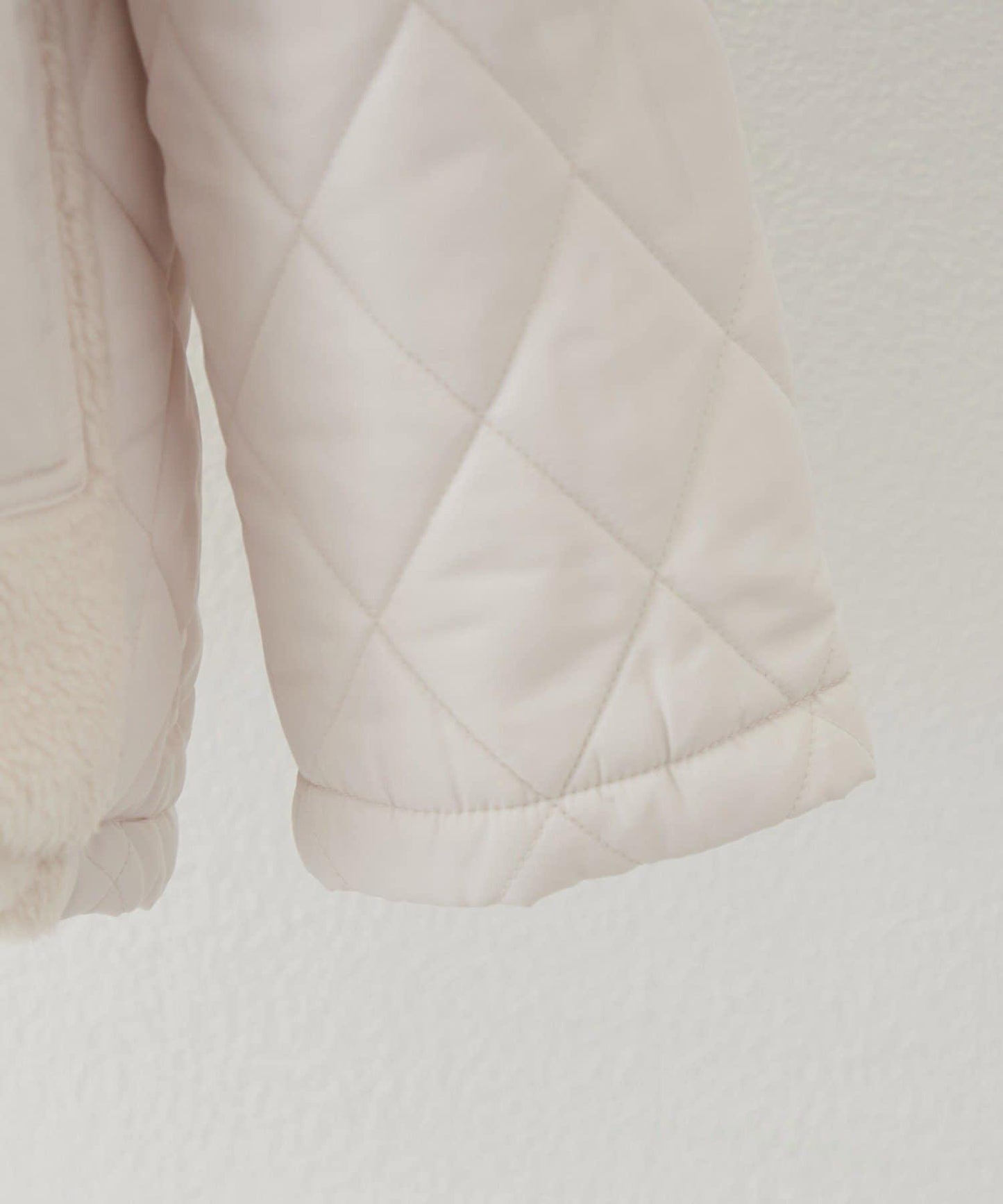 羊羔絨拼接絎縫立領夾克