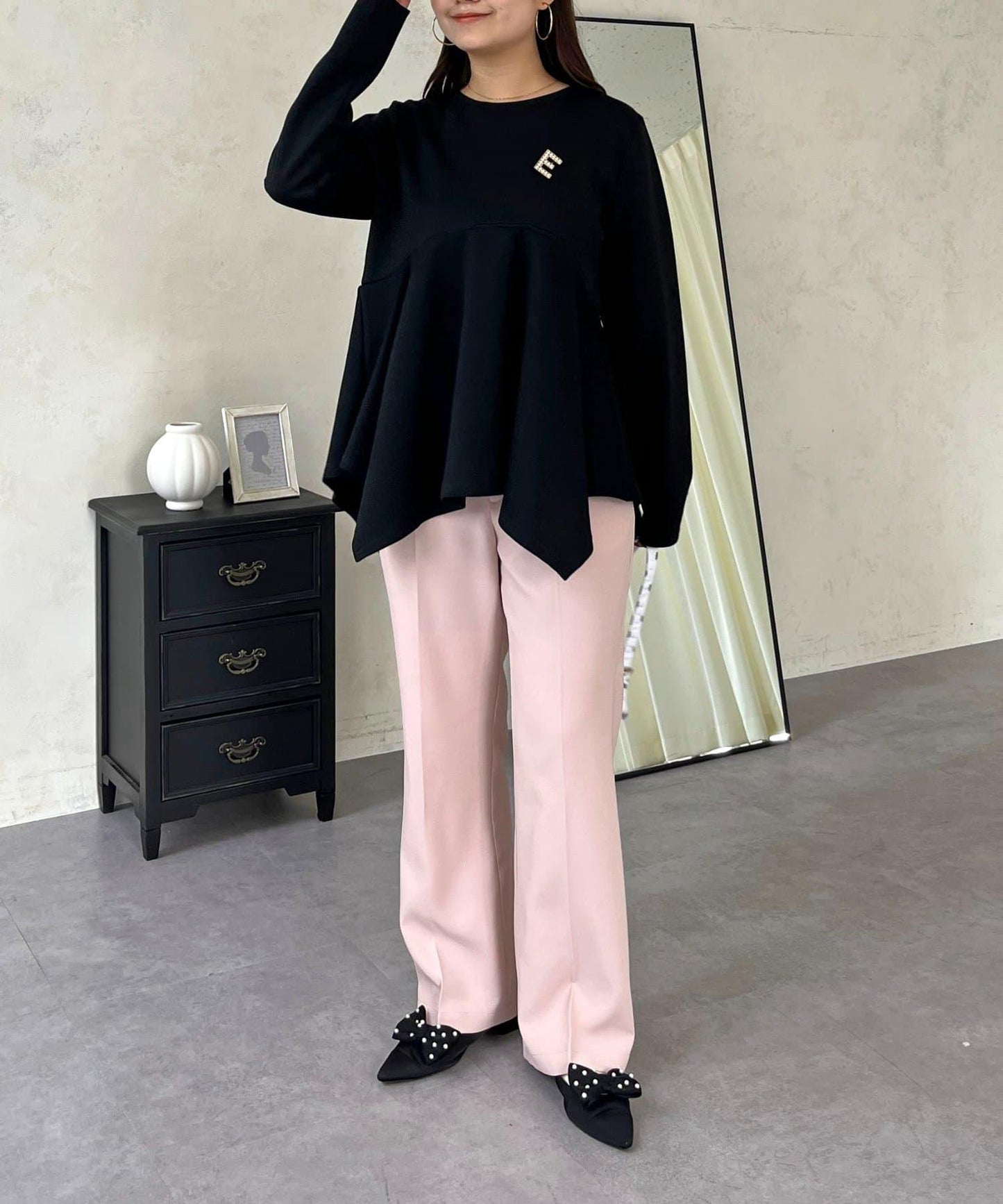 不規則下襬弧形荷葉邊長袖T恤