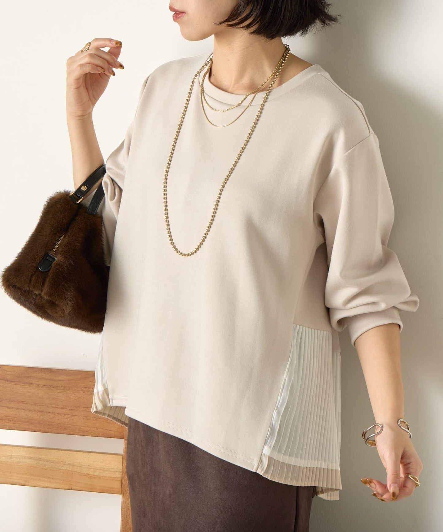 下襬百褶拼接針織上衣