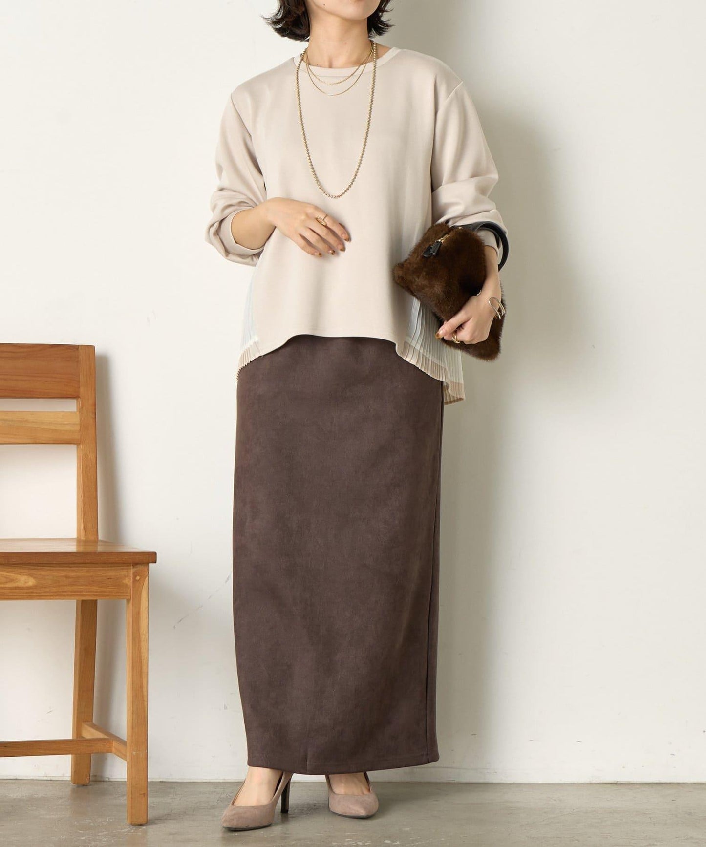 下襬百褶拼接針織上衣