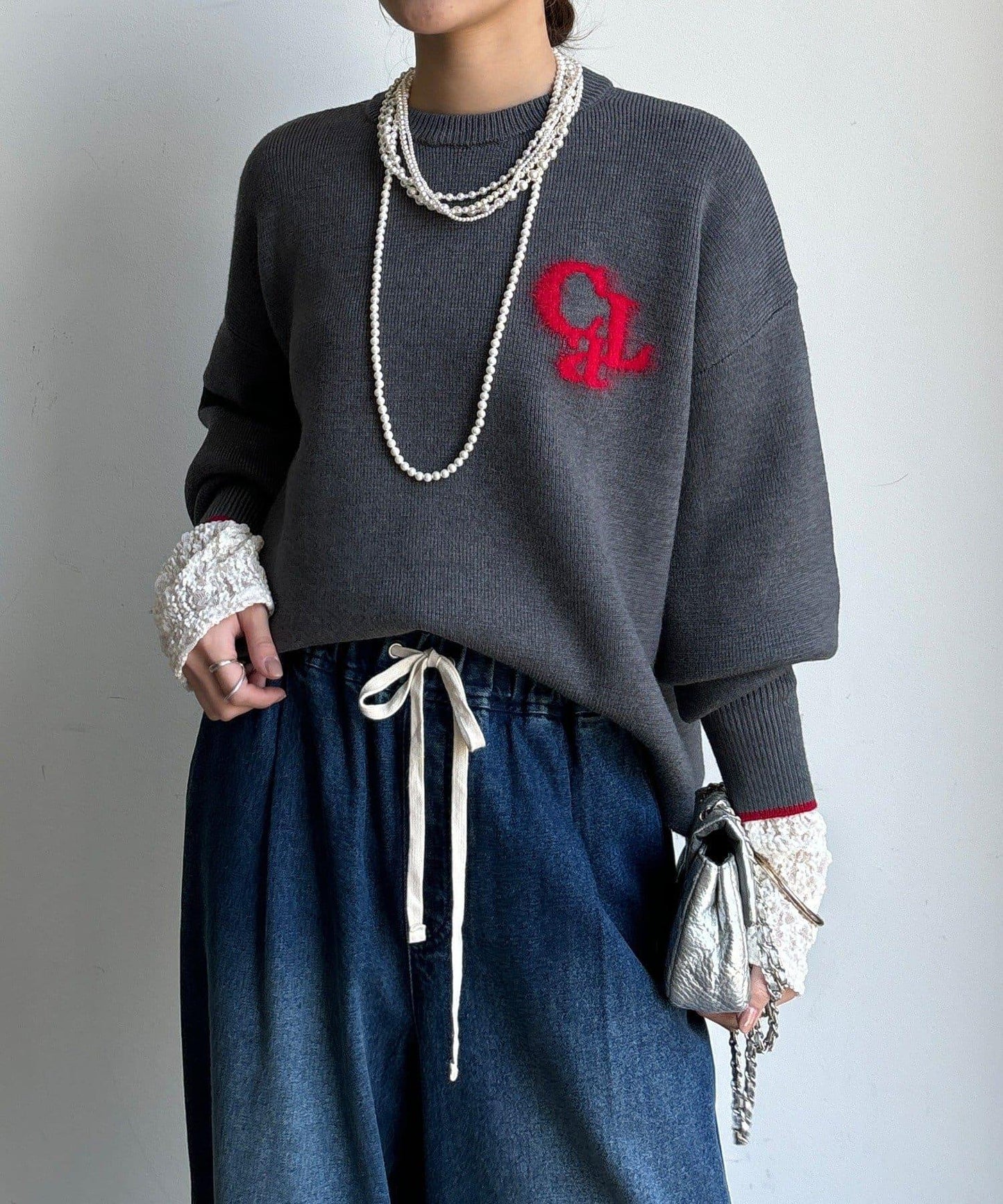 羽毛標誌針織衫