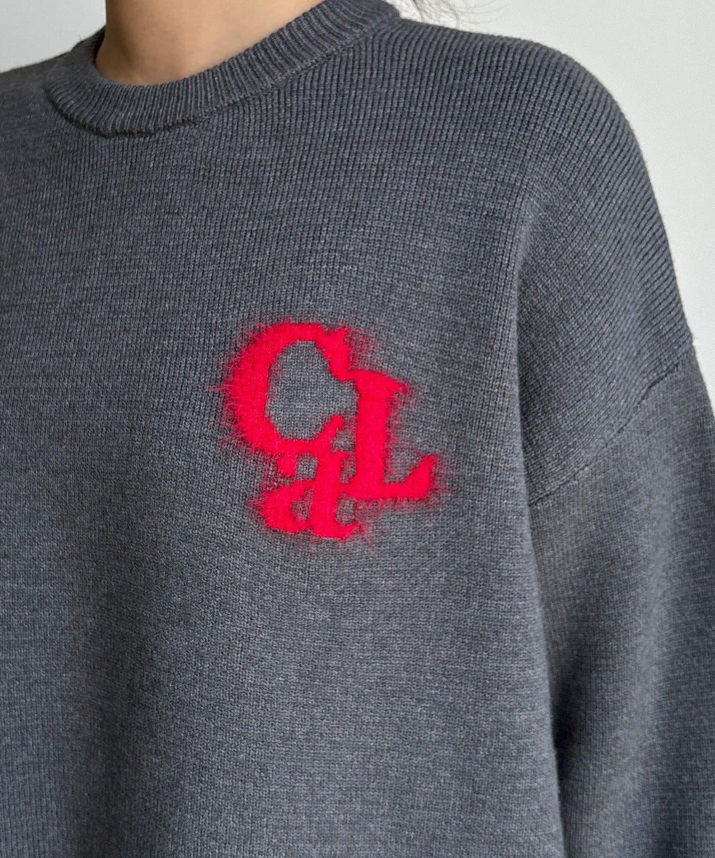 羽毛標誌針織衫