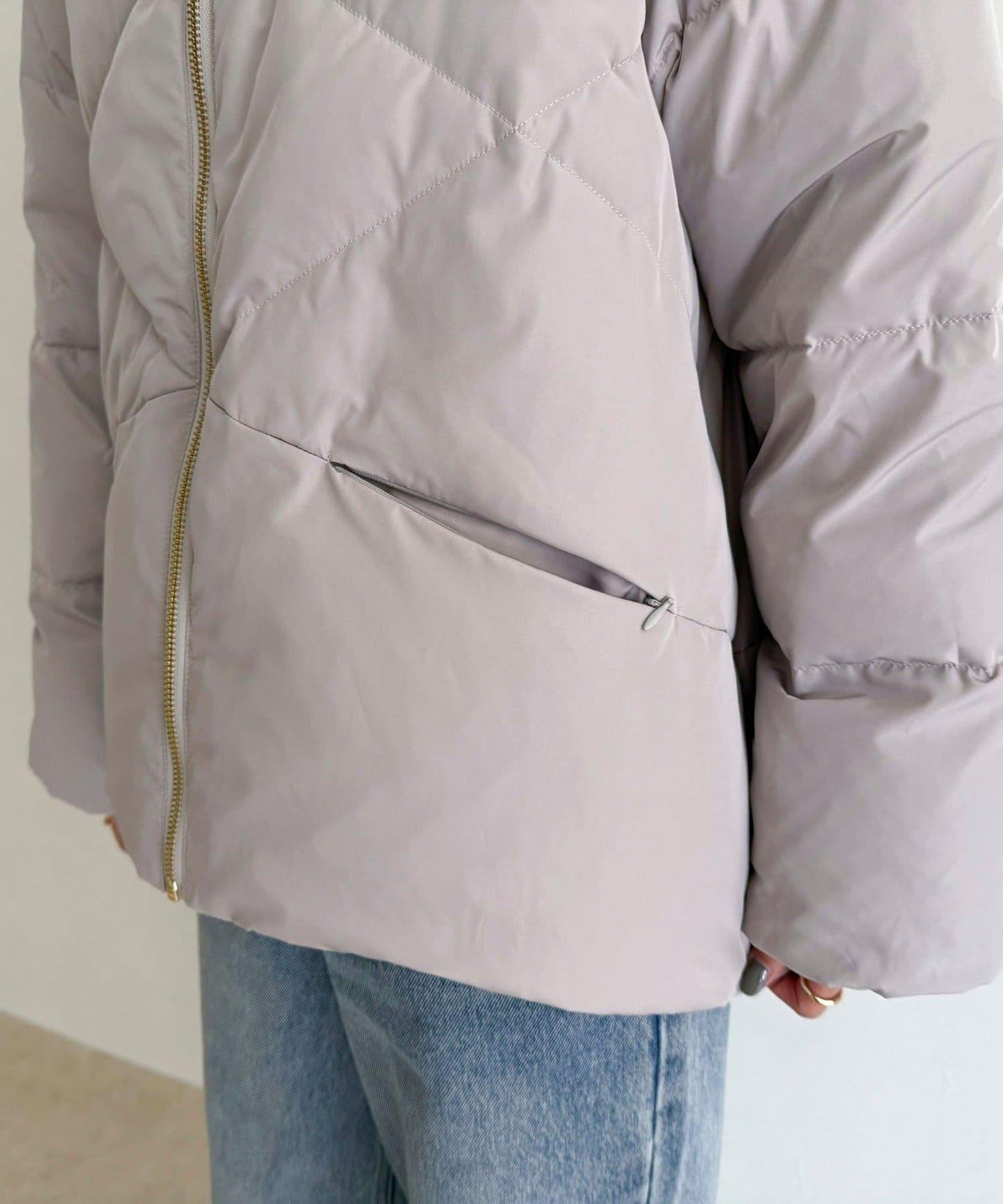 柔軟交叉羽絨大衣