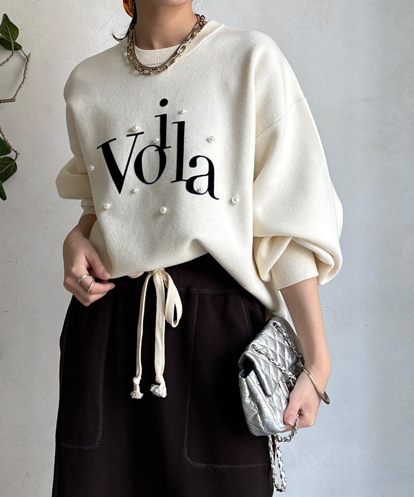 珍珠標誌針織上衣