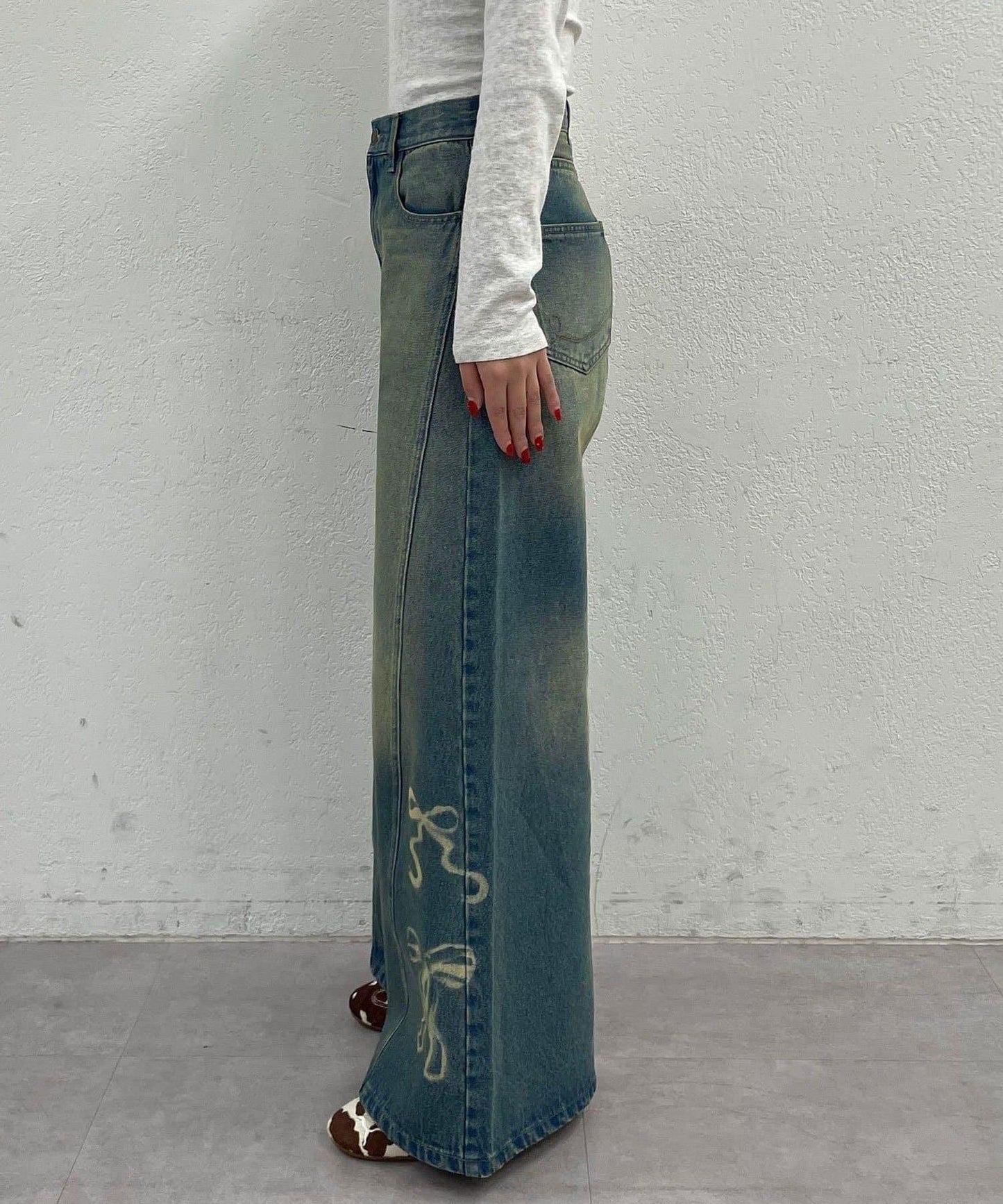 蝴蝶結拔染印花牛仔褲