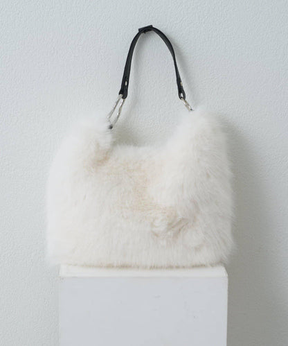 波浪扣皮革手柄毛絨揹包