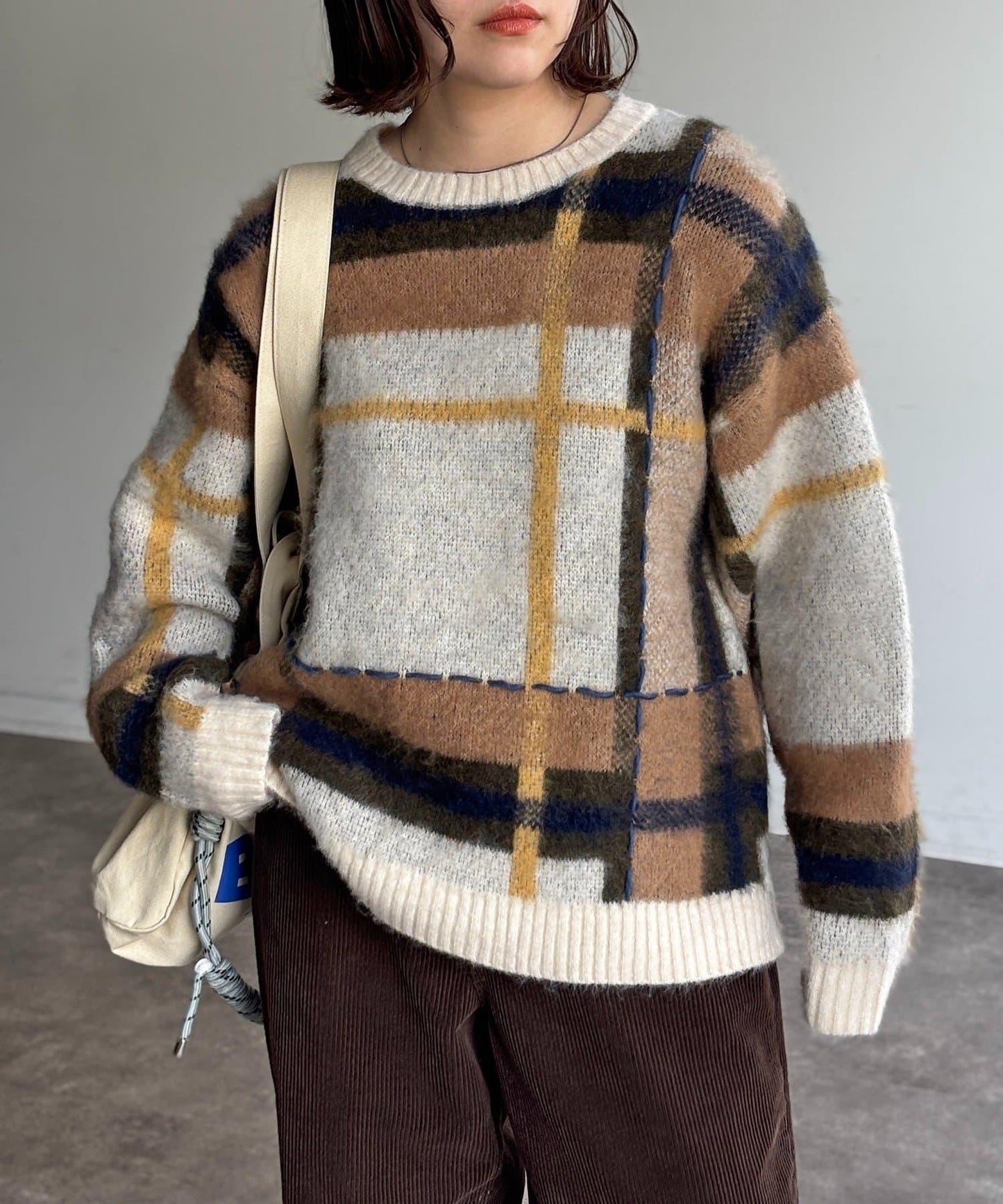 格紋流蘇拼接針織衫