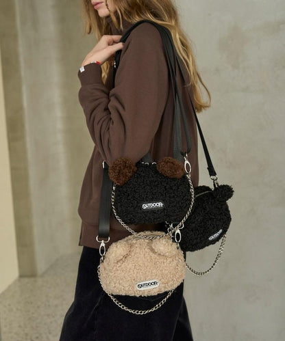 x BASICKS 仿羊羔絨熊造型包