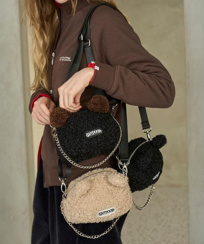 x BASICKS 仿羊羔絨熊造型包