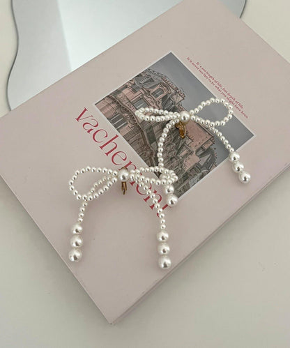 珍珠蝴蝶結耳環