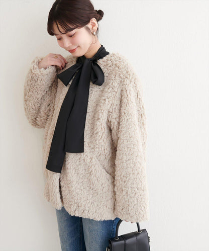 拼色仿羊羔絨中長款大衣