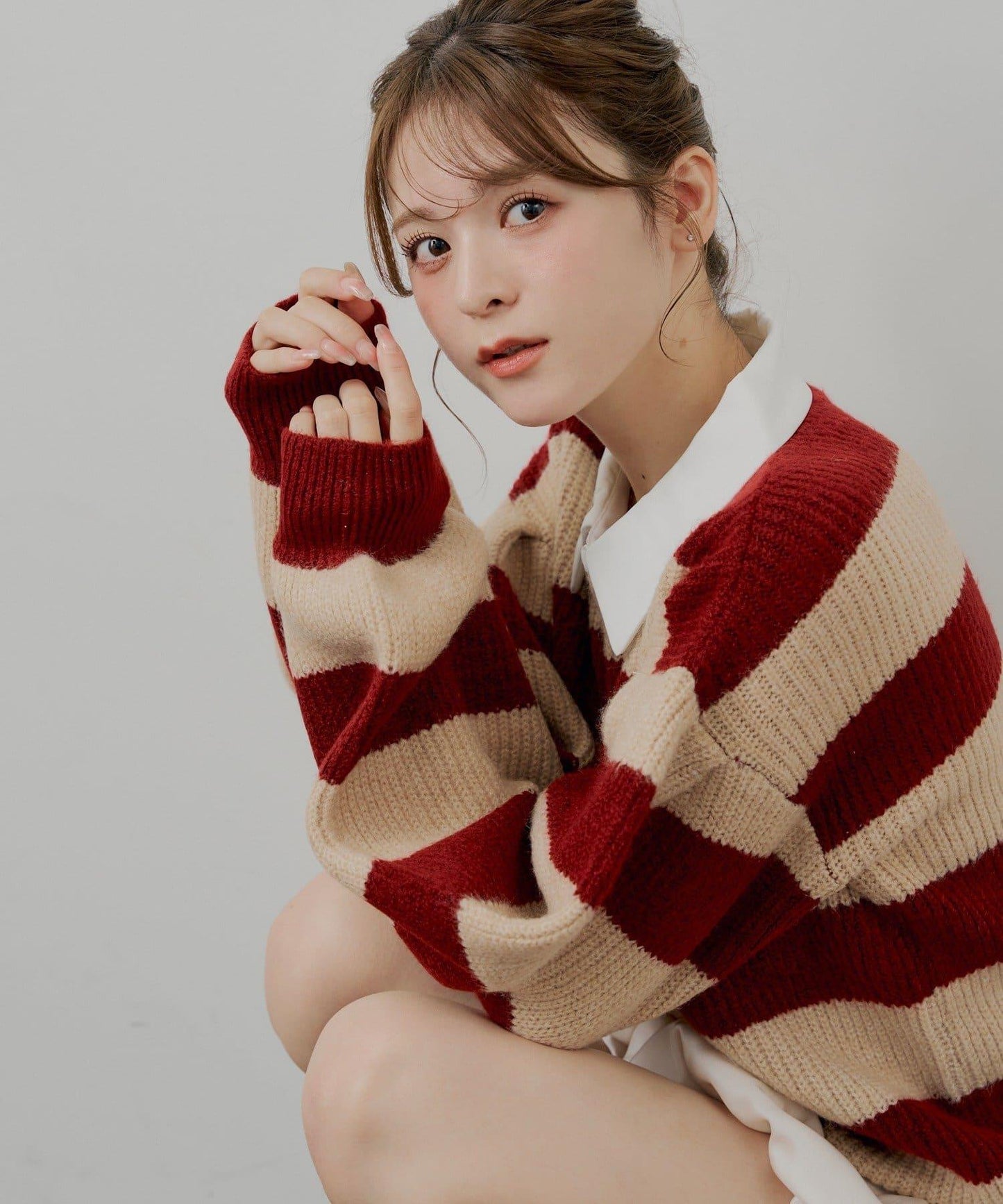 寬鬆條紋橄欖球針織衫