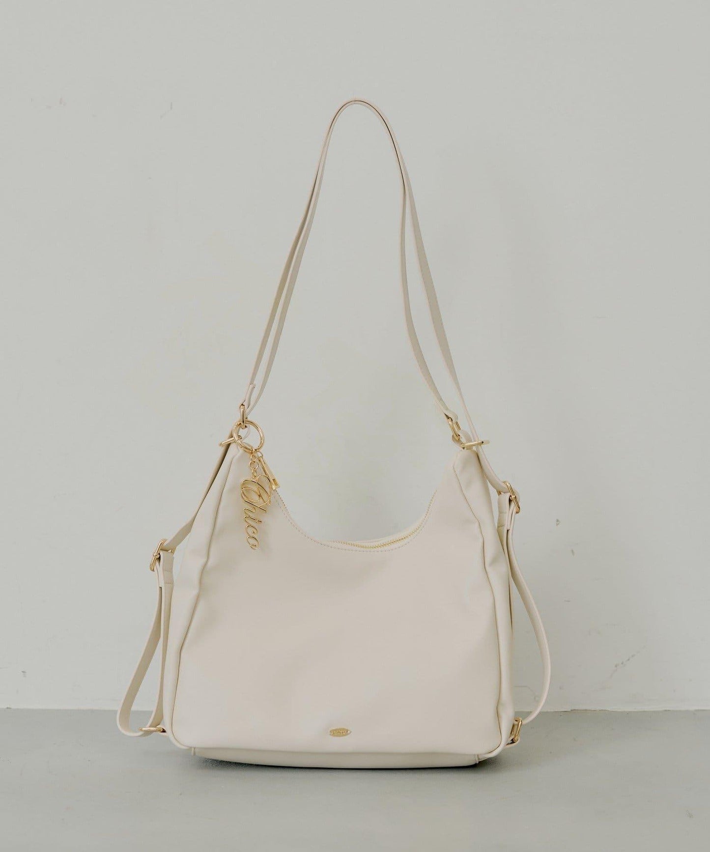 附標誌吊飾三用腋下包