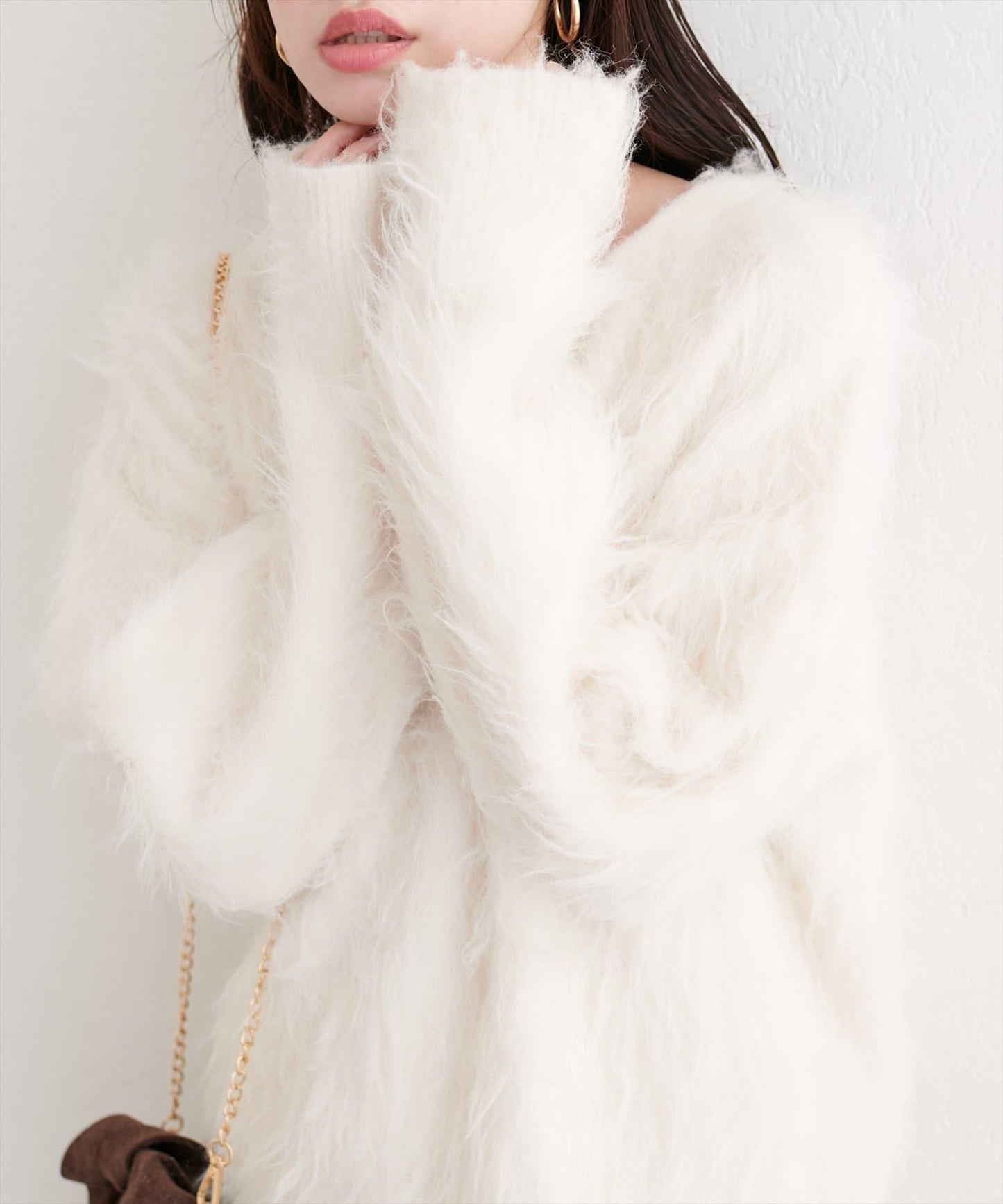 長款羽毛圓領針織套頭衫