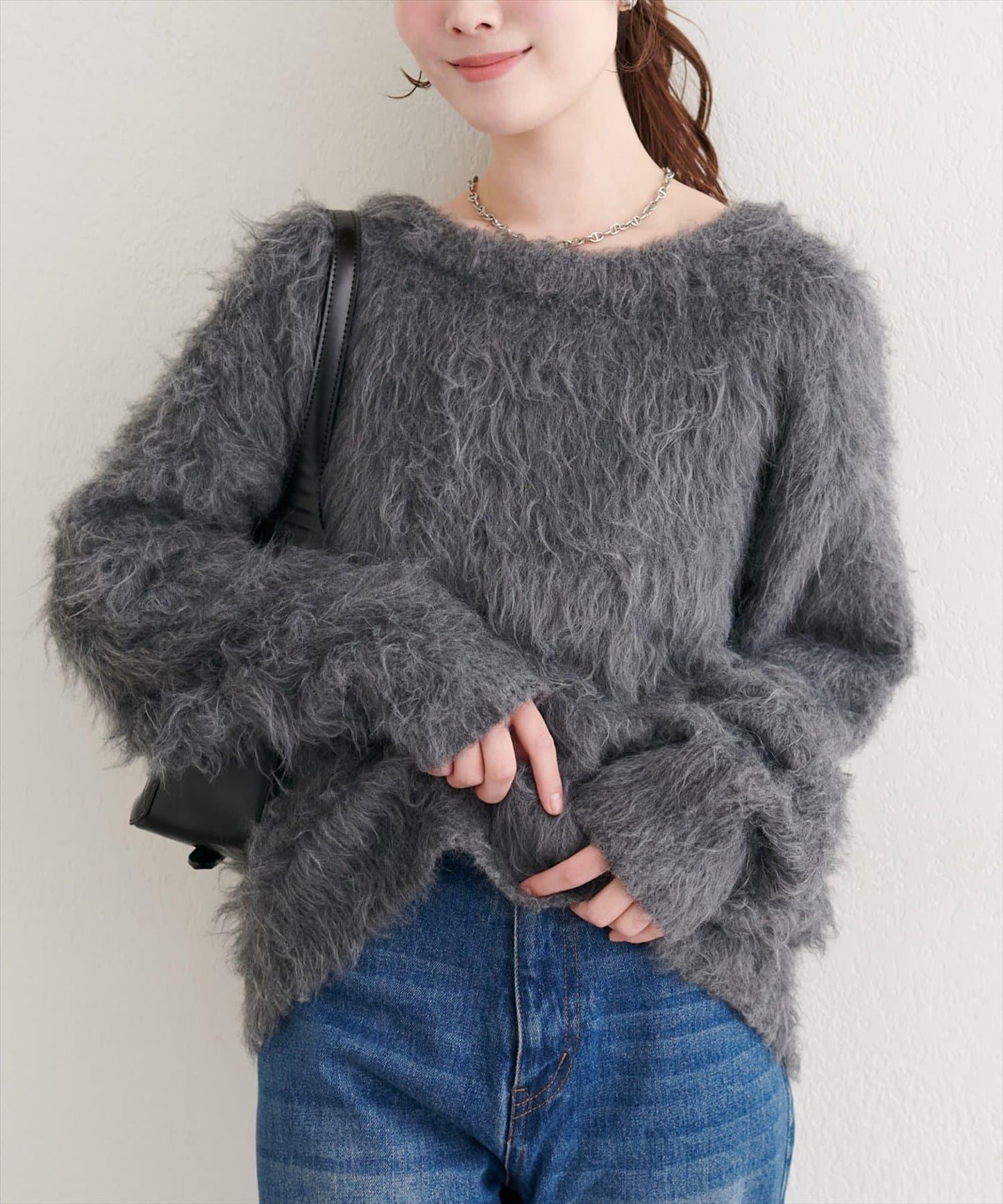 長款羽毛圓領針織套頭衫