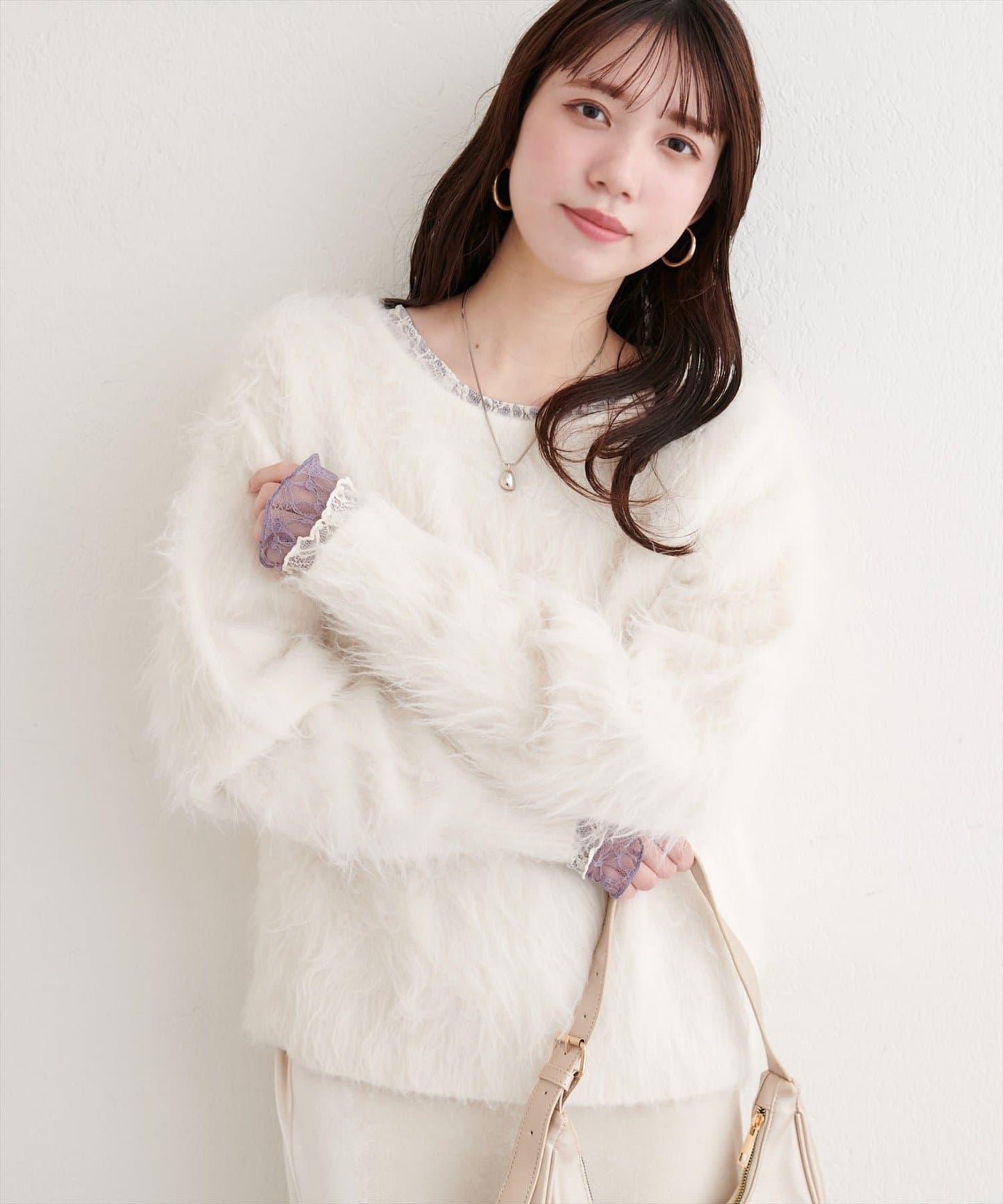 長款羽毛圓領針織套頭衫