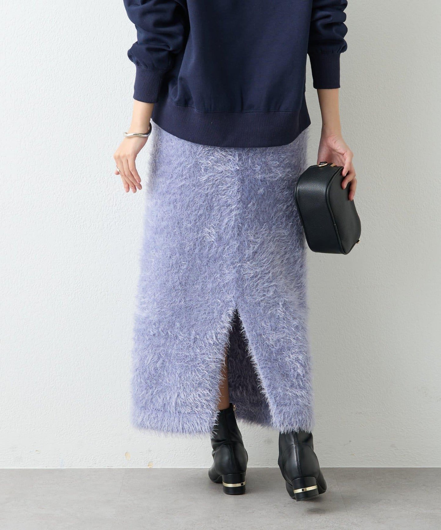 造型點睛之選 軟質長毛背部開衩修身半身裙