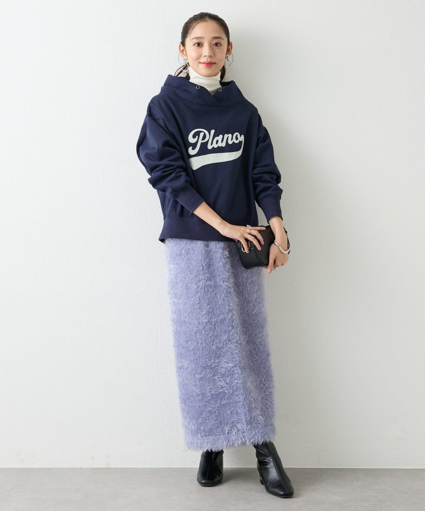 造型點睛之選 軟質長毛背部開衩修身半身裙