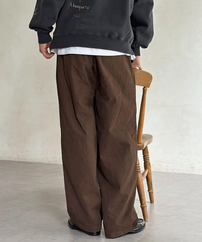 色素染斜紋寬鬆褶皺長褲