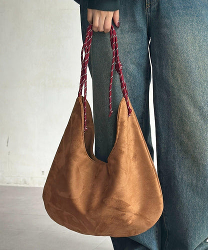 仿麂皮抽繩斜挎包