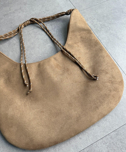 仿麂皮抽繩斜挎包