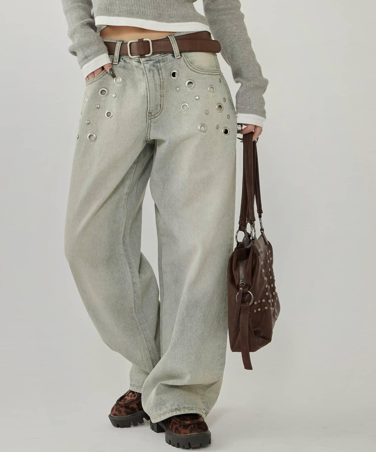 金屬孔眼高腰牛仔褲