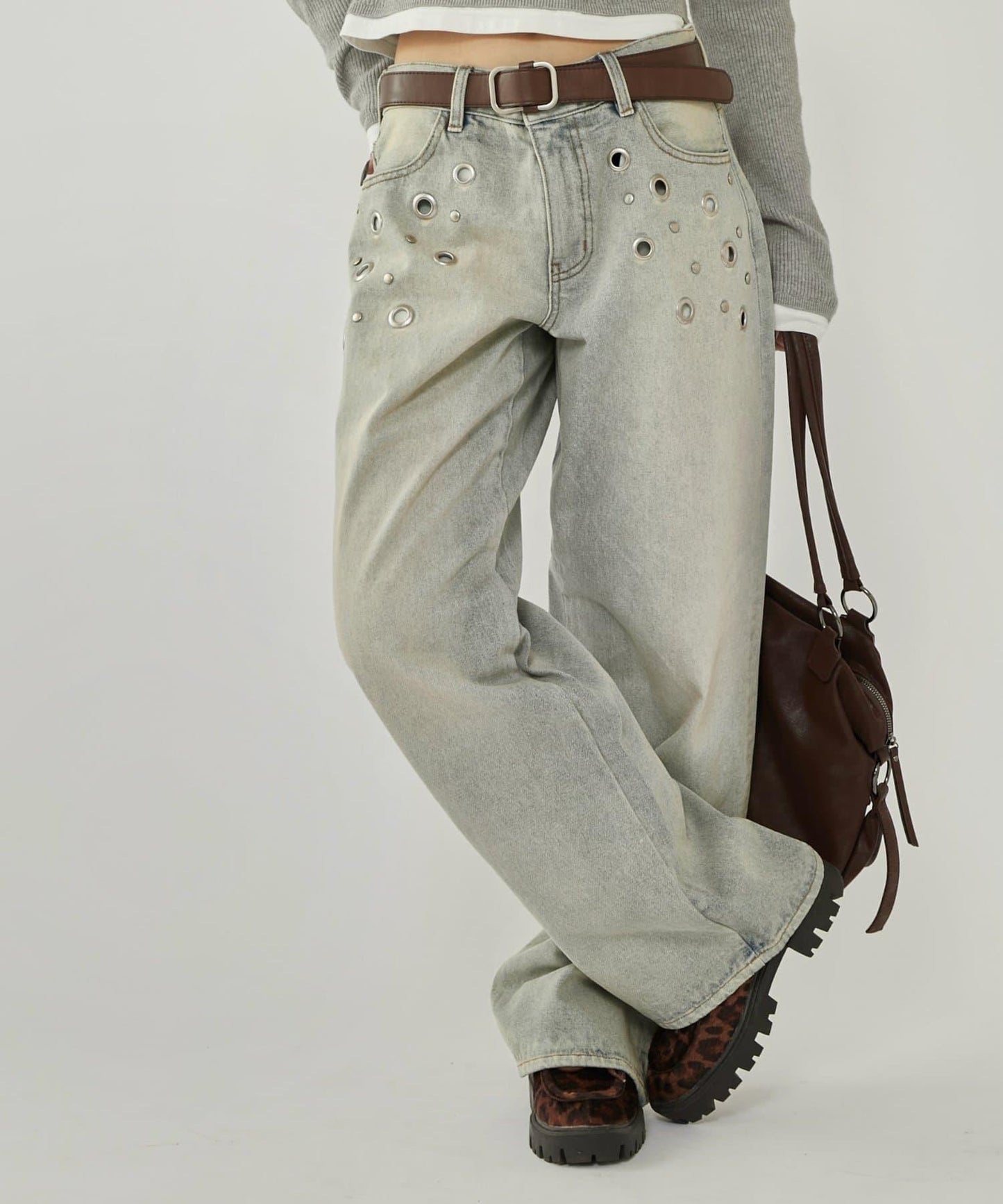 金屬孔眼高腰牛仔褲