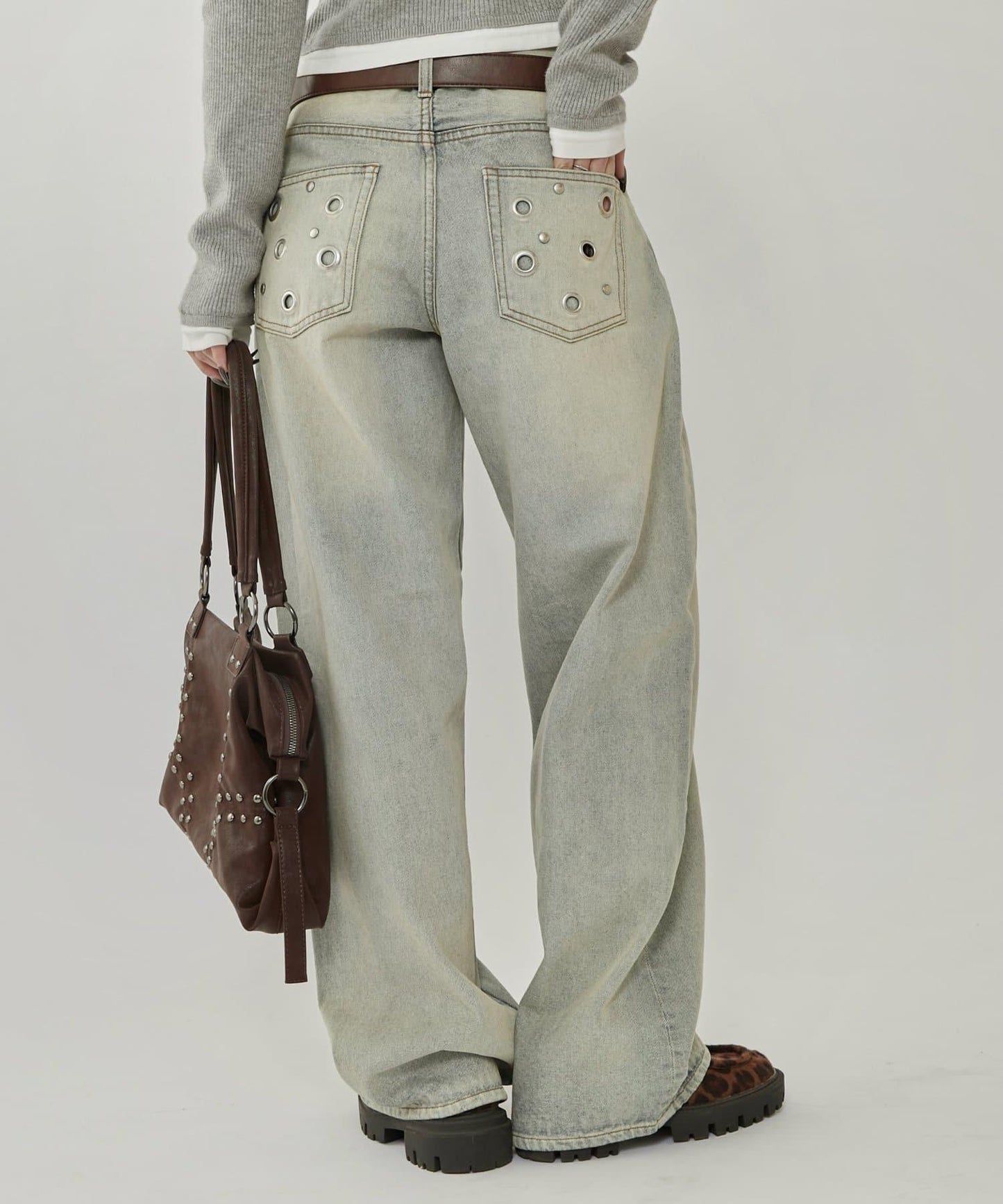 金屬孔眼高腰牛仔褲