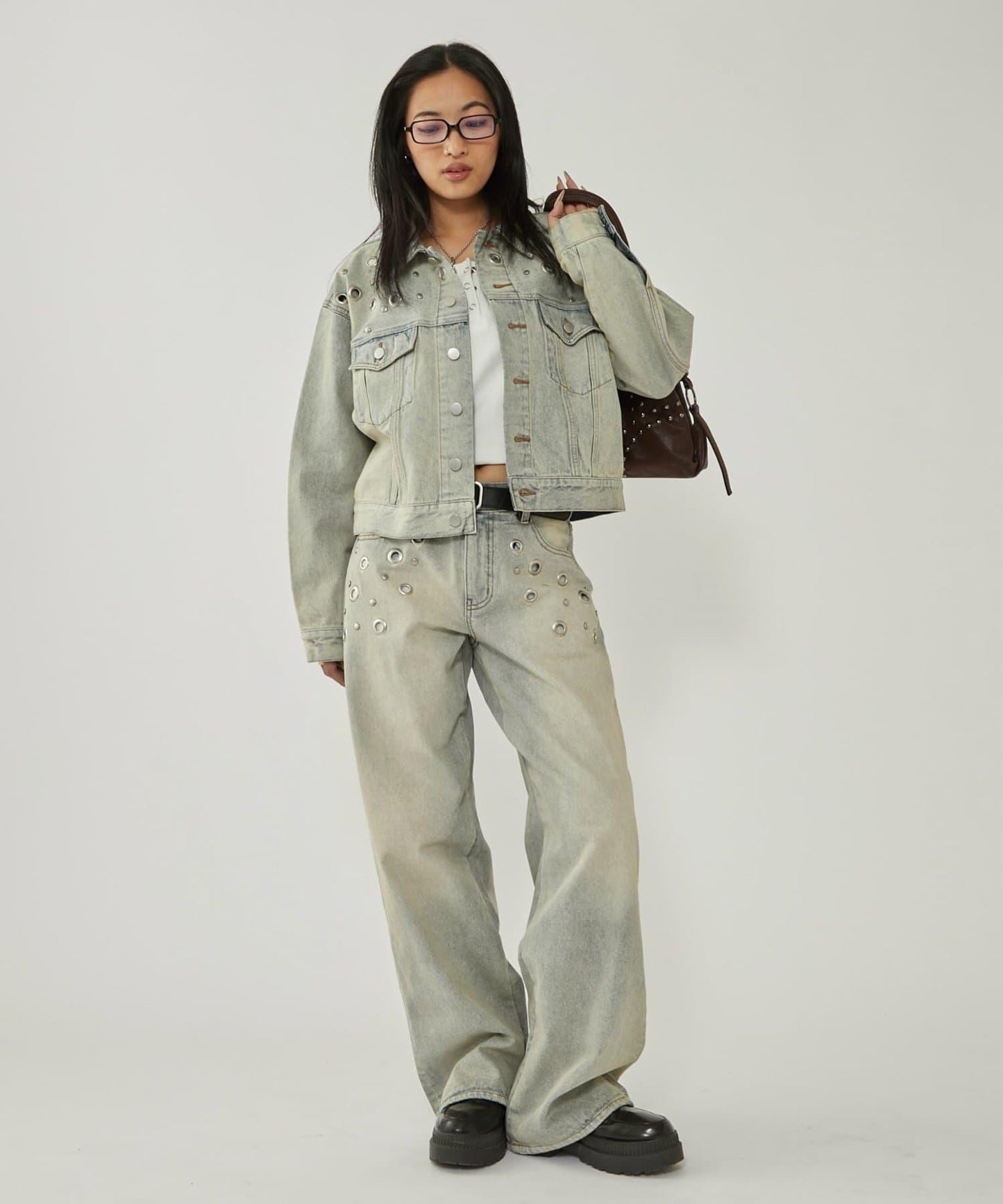 金屬孔眼高腰牛仔褲