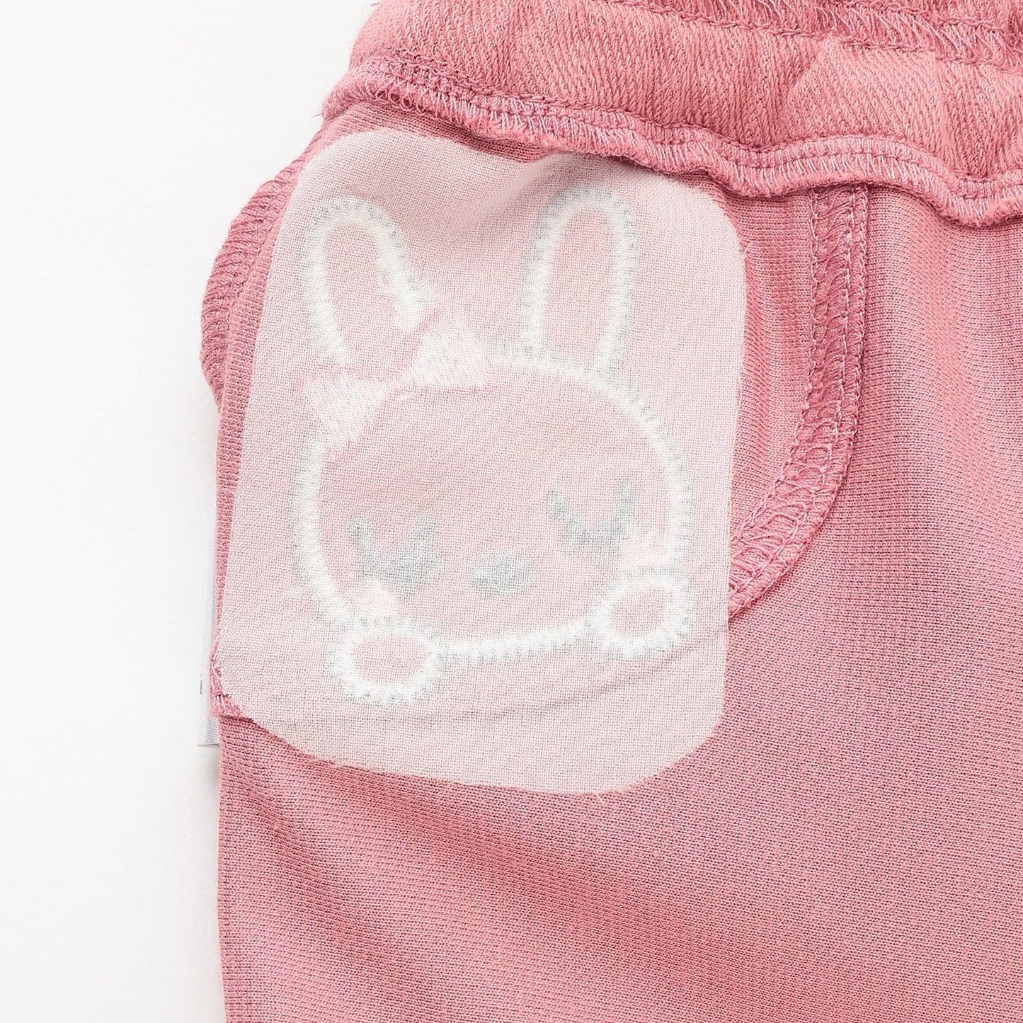 mimi醬貼布裝飾臀部荷葉邊針織斜紋長褲