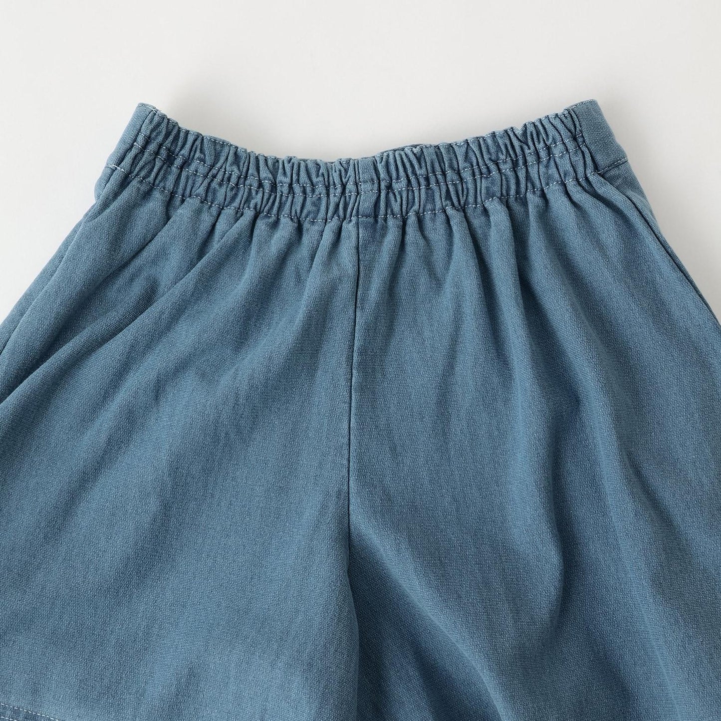 針織牛仔百褶裹裙式闊腿褲