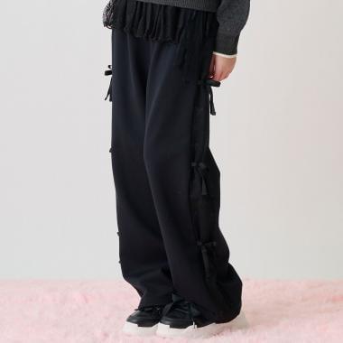 側邊標誌蝴蝶結內里加絨降落傘褲