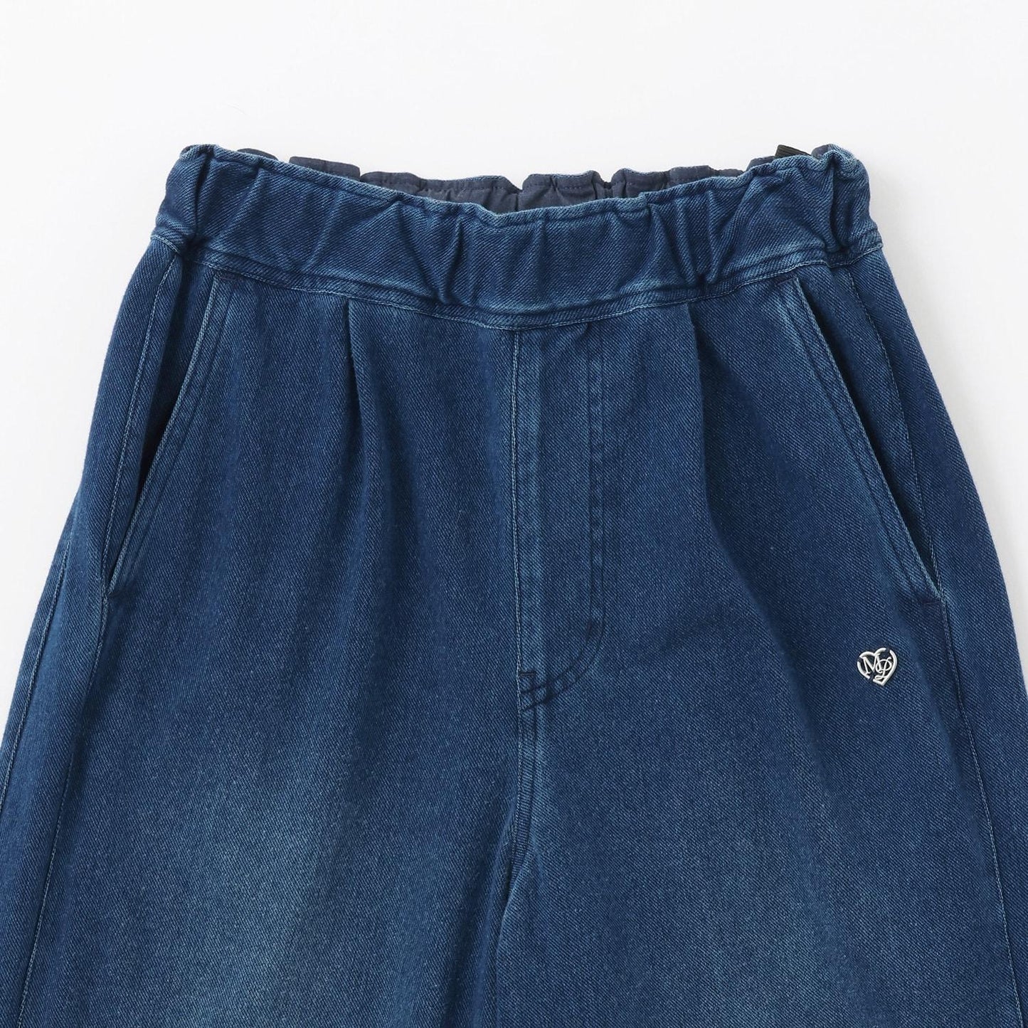 側邊標誌蝴蝶結內里加絨降落傘褲