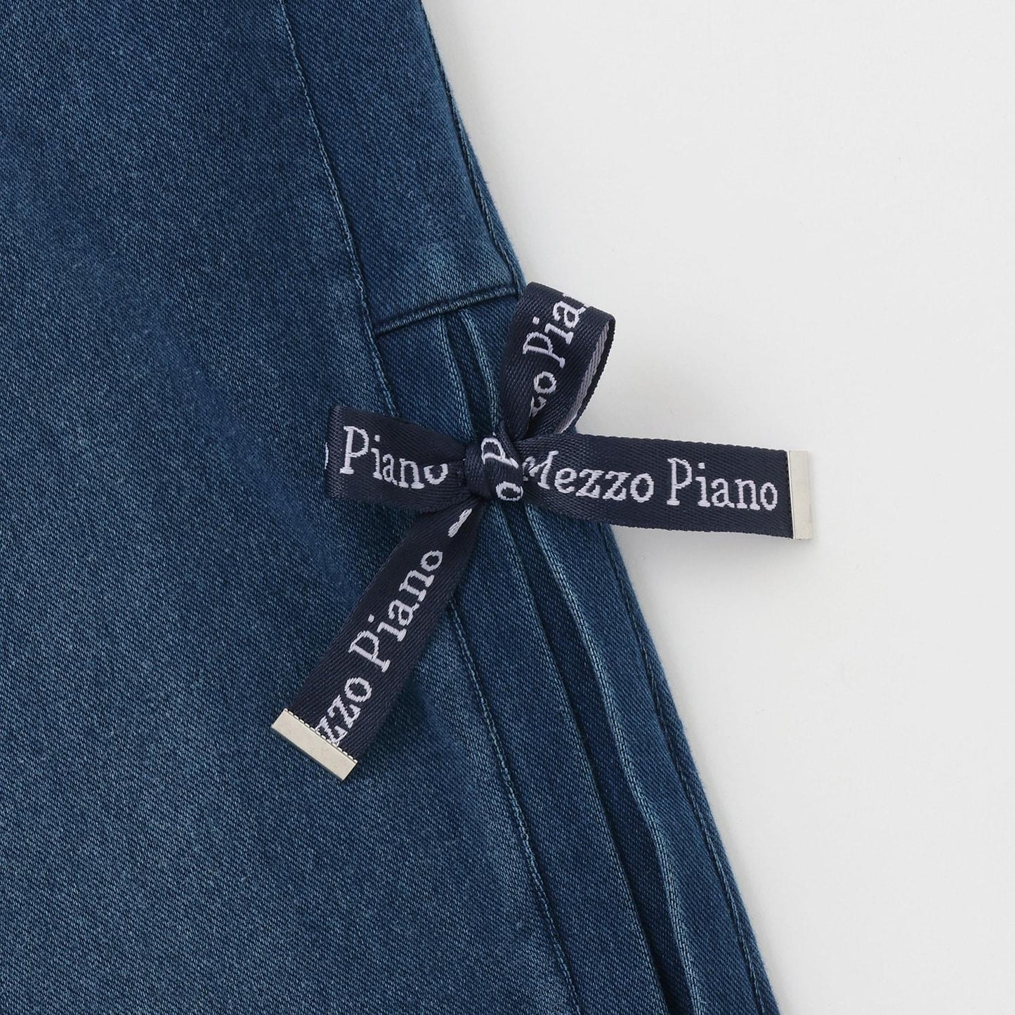 側邊標誌蝴蝶結內里加絨降落傘褲