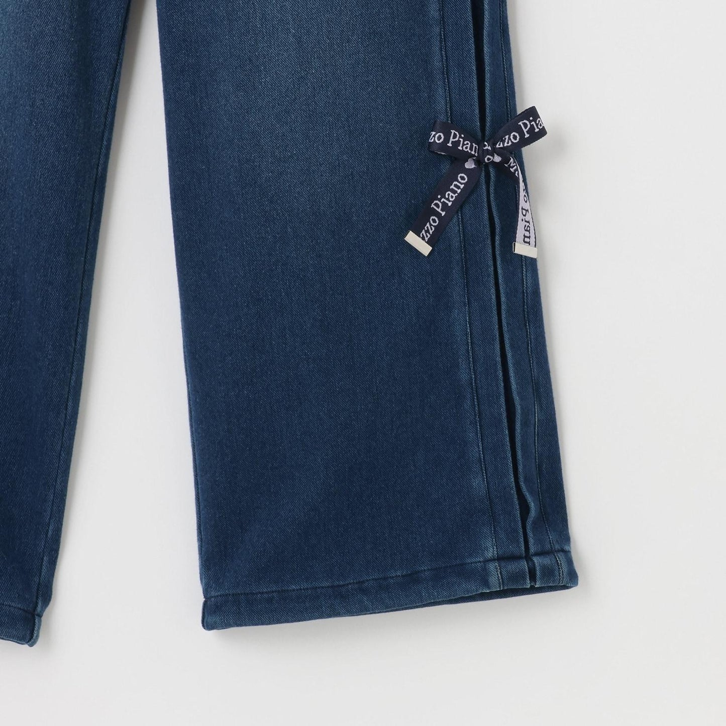 側邊標誌蝴蝶結內里加絨降落傘褲