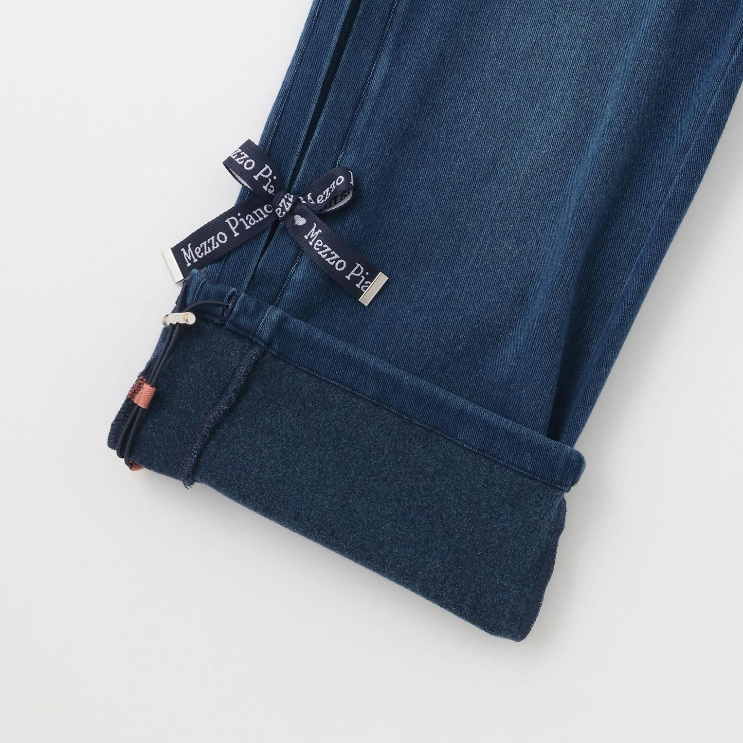 側邊標誌蝴蝶結內里加絨降落傘褲