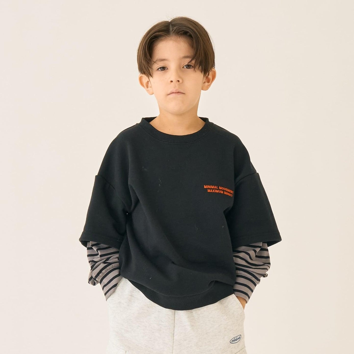 假兩件袖層疊設計衛衣