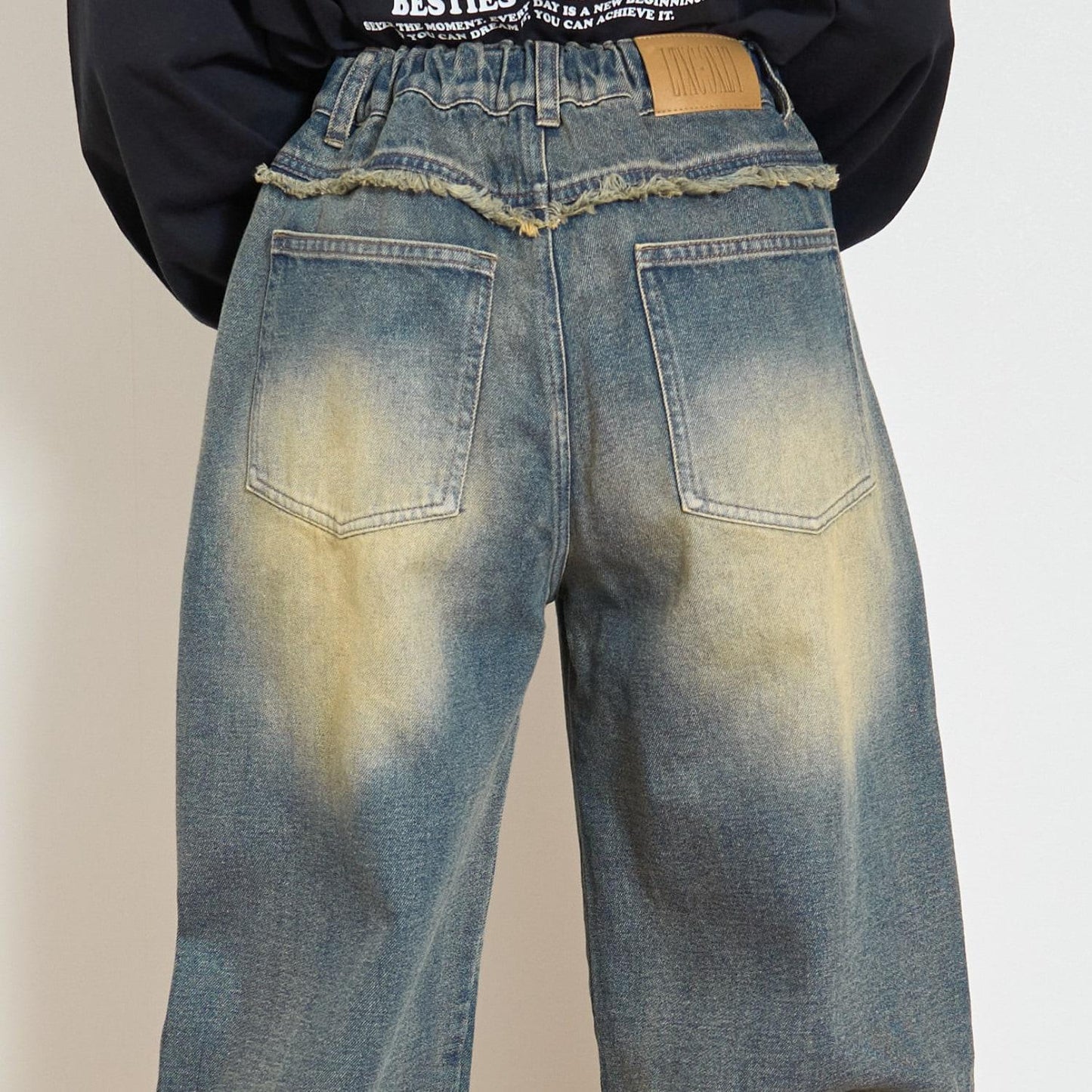 鉚釘流蘇牛仔褲