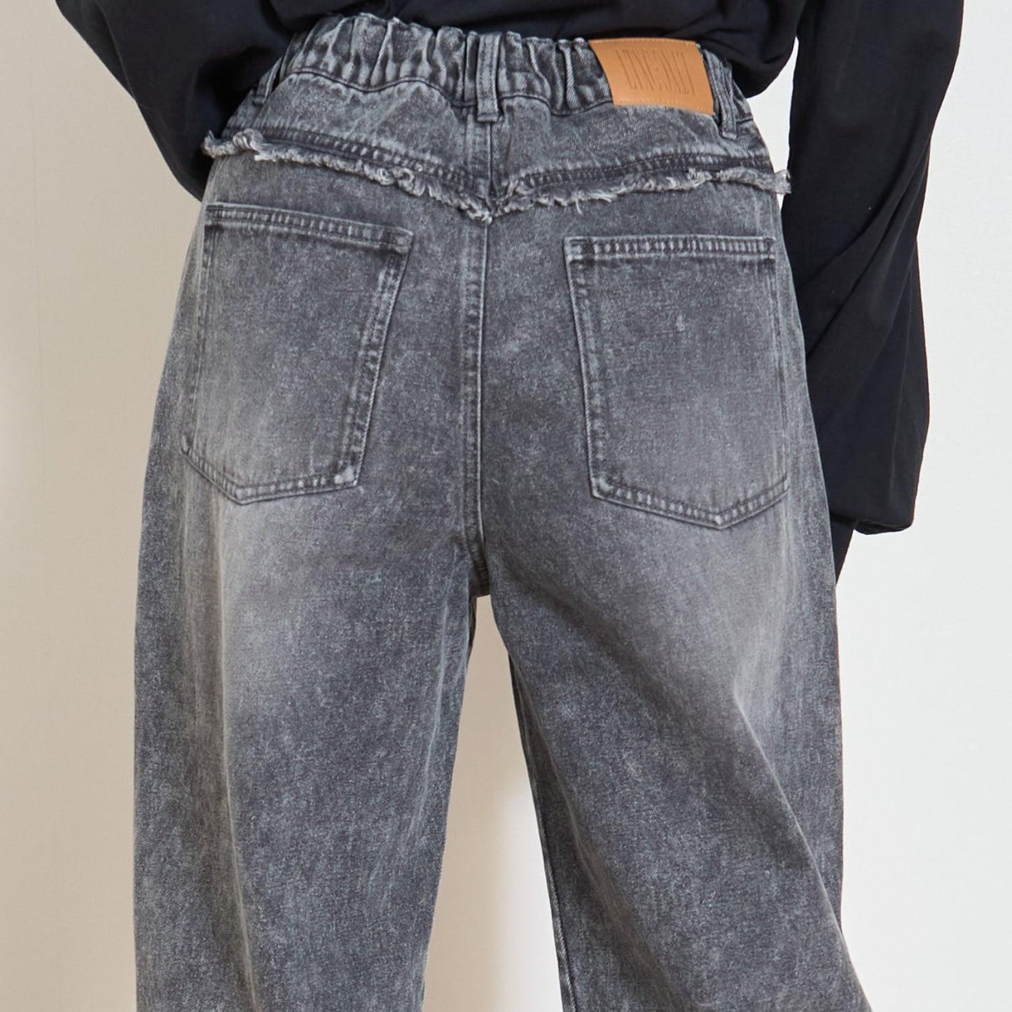 鉚釘流蘇牛仔褲