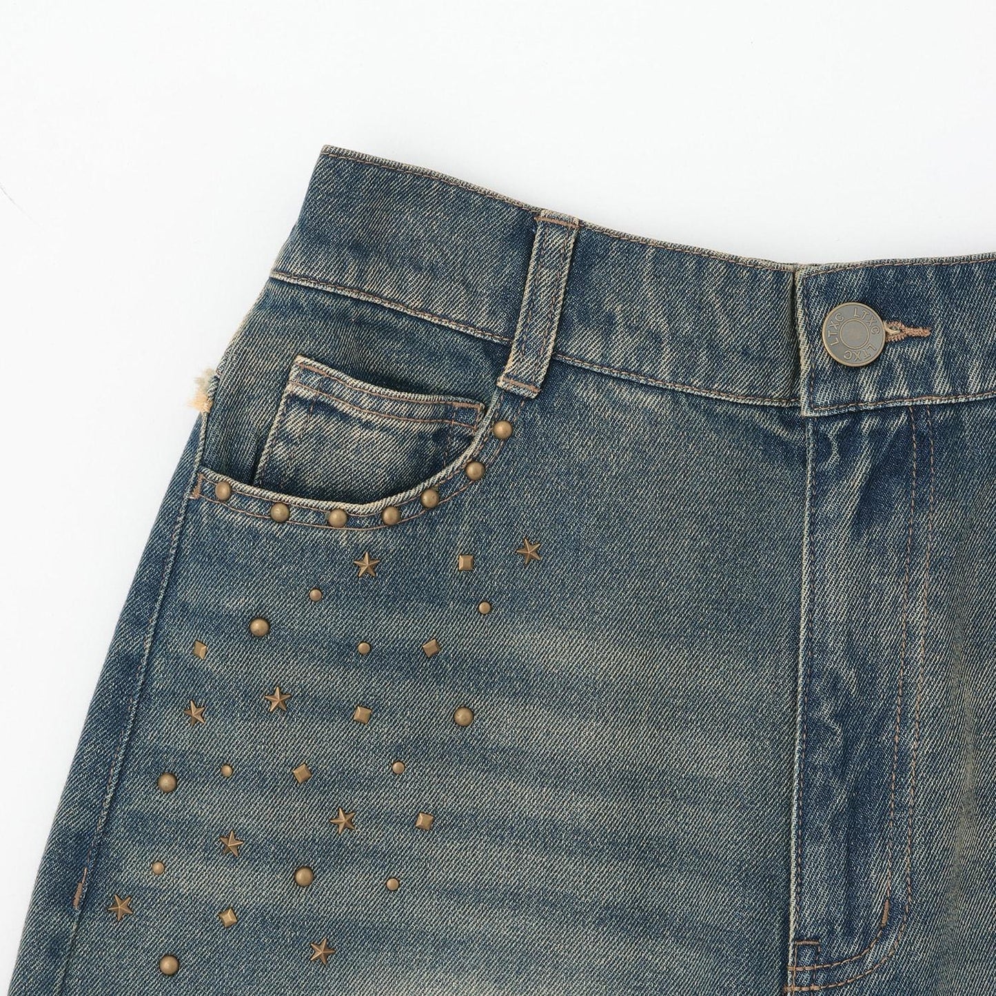 鉚釘流蘇牛仔褲