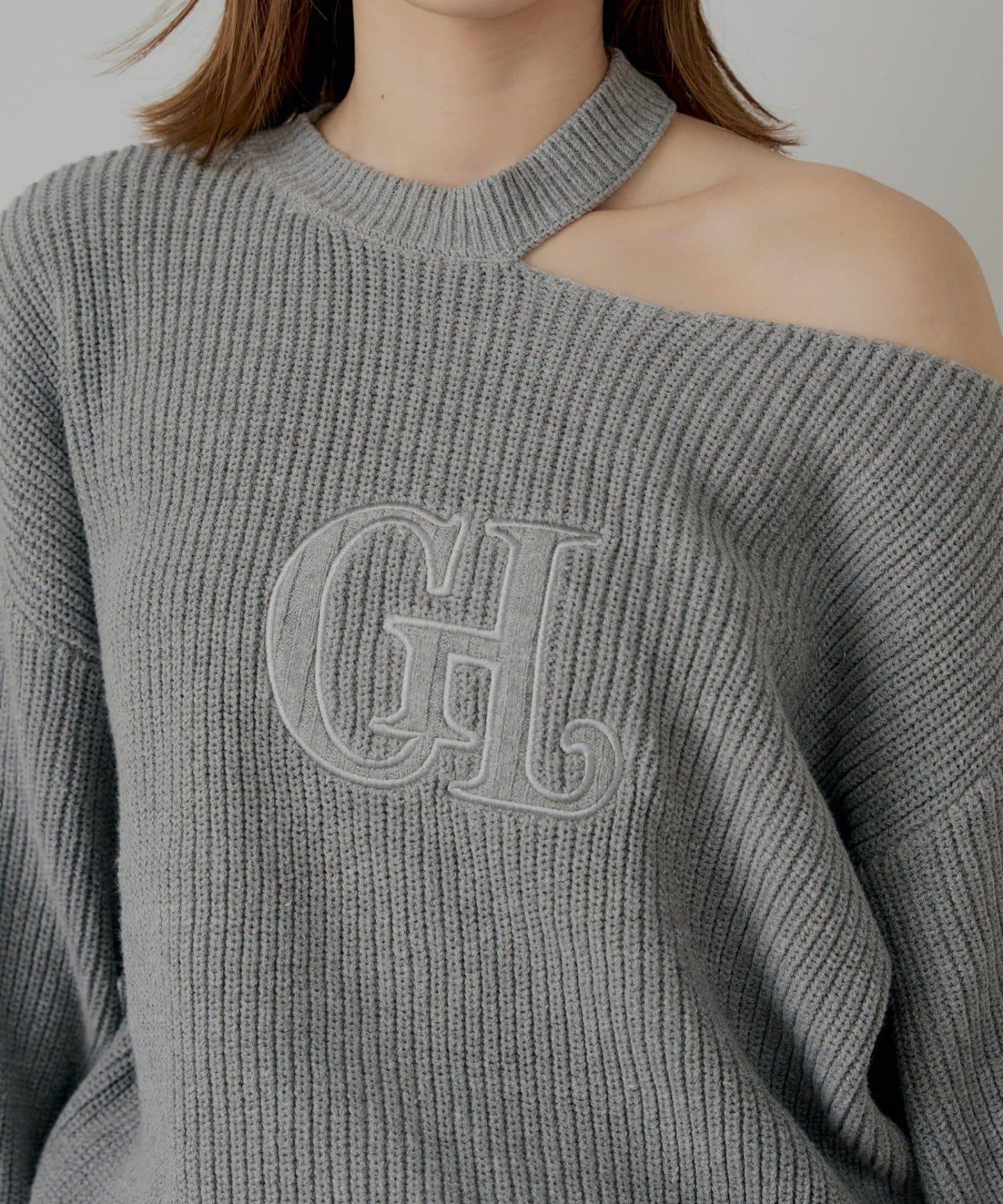 肩部開叉一字肩針織衫