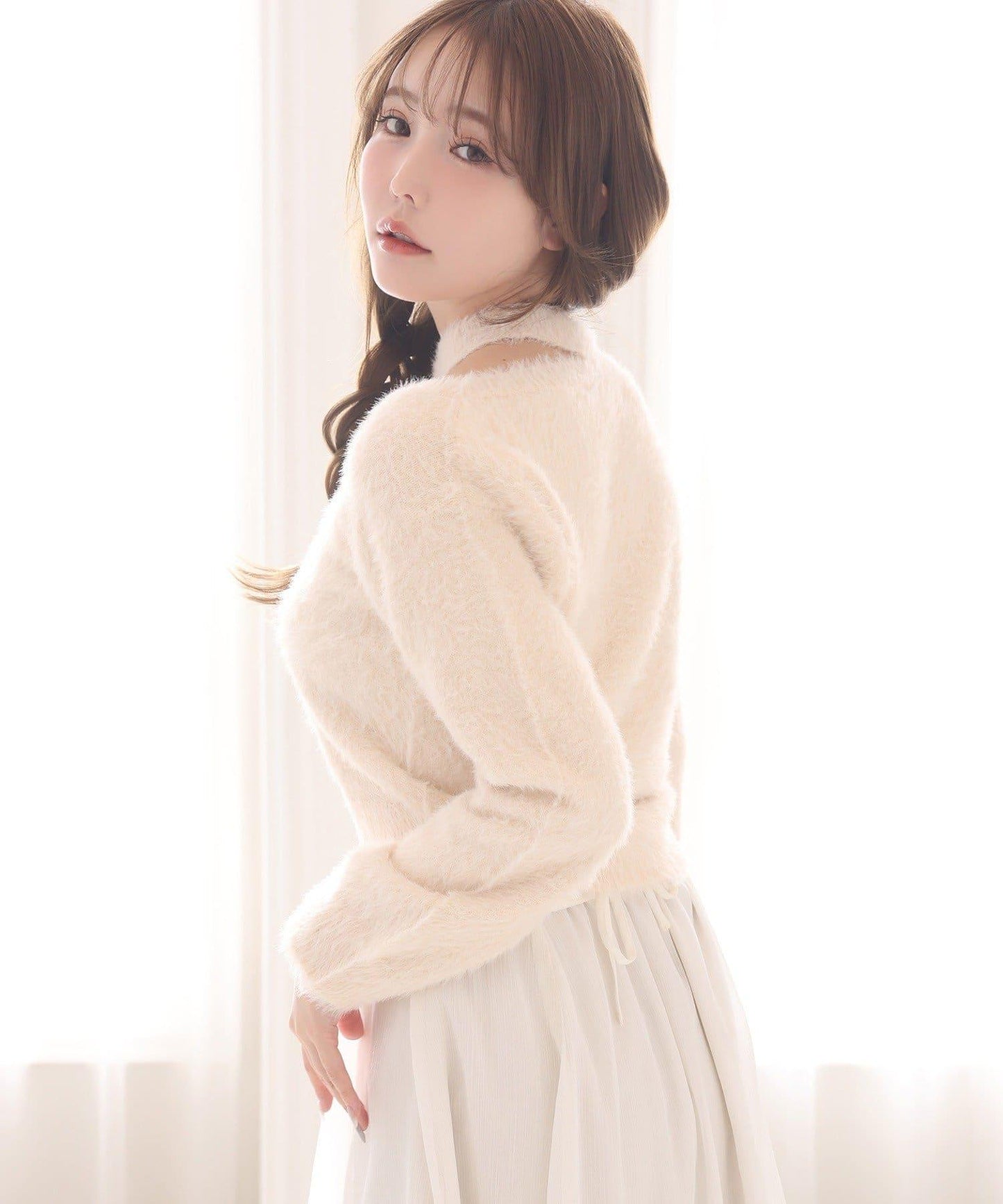 帶飾牌羽毛針織衫