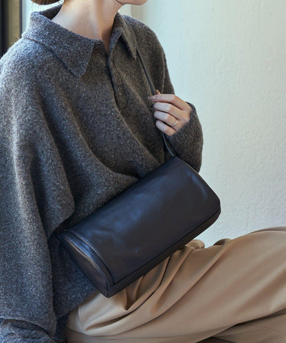 軟皮卷式單肩包