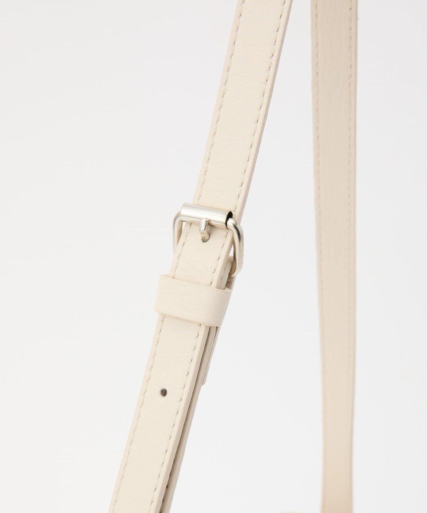 軟皮卷式單肩包