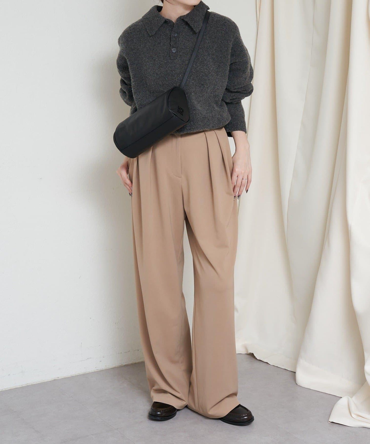 軟皮卷式單肩包