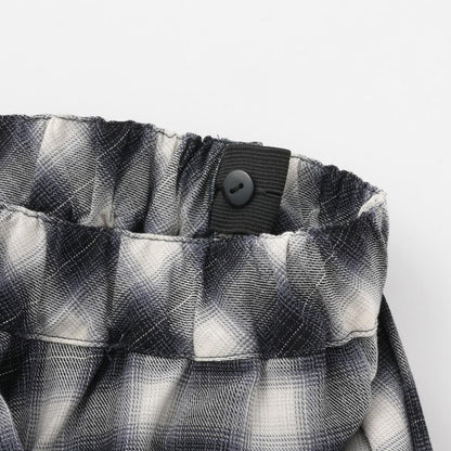 格紋不規則下襬半身裙