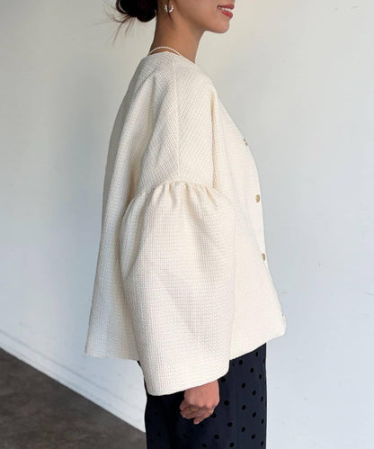 可用於正式場合的喇叭袖花呢夾克