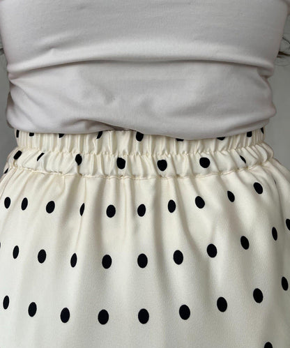 緞面波點斜裁半身裙