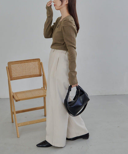 扣袢亨利領蓬鬆針織衫